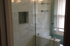 barn style slider on tub with return panel to wall