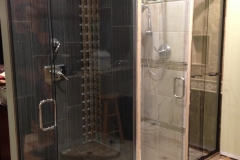 shower door displays installed by reflections in glass