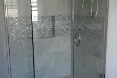 door panel with a return panel and corner clamp