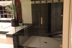 gold shower door with notch panel return