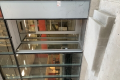 Storefront entry system.