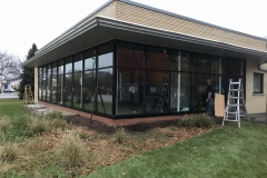 Bronze storefront facelift with door
