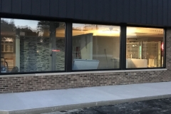 Bronze storefront facelift with door