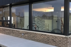 Bronze storefront facelift with door