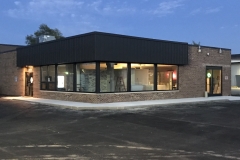 Bronze storefront facelift with door